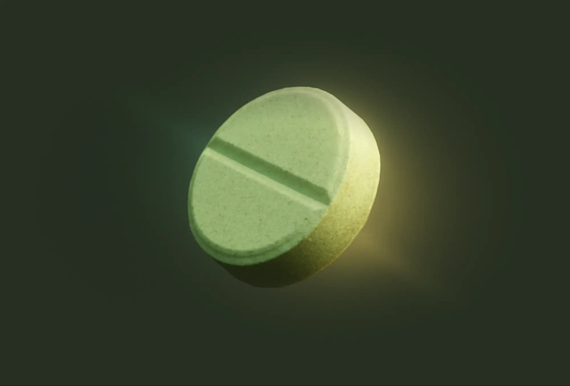 Round green tablet floating, emitting subtle glow
